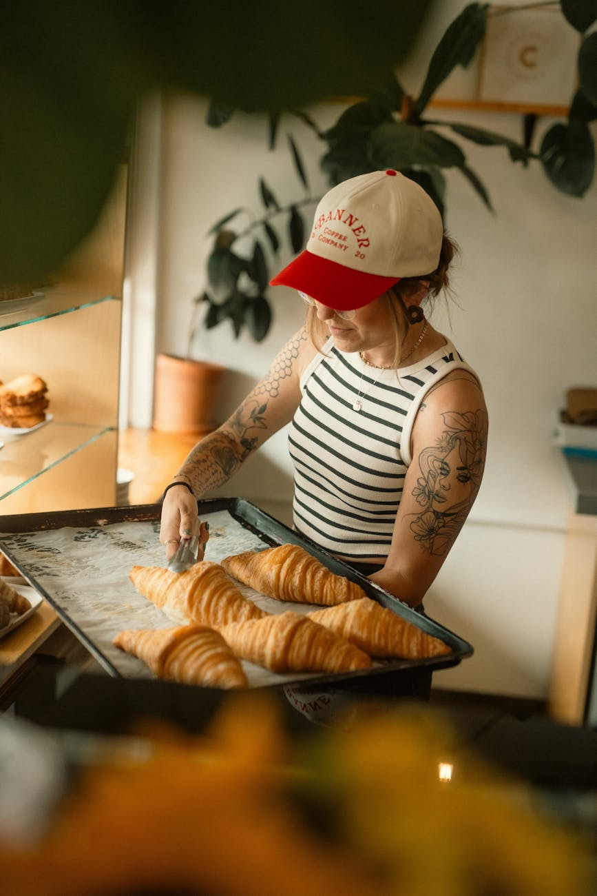barista preparing freshly baked croissants