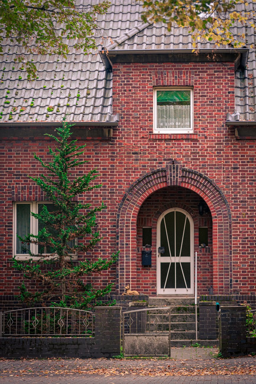 charming brick house with arched doorway