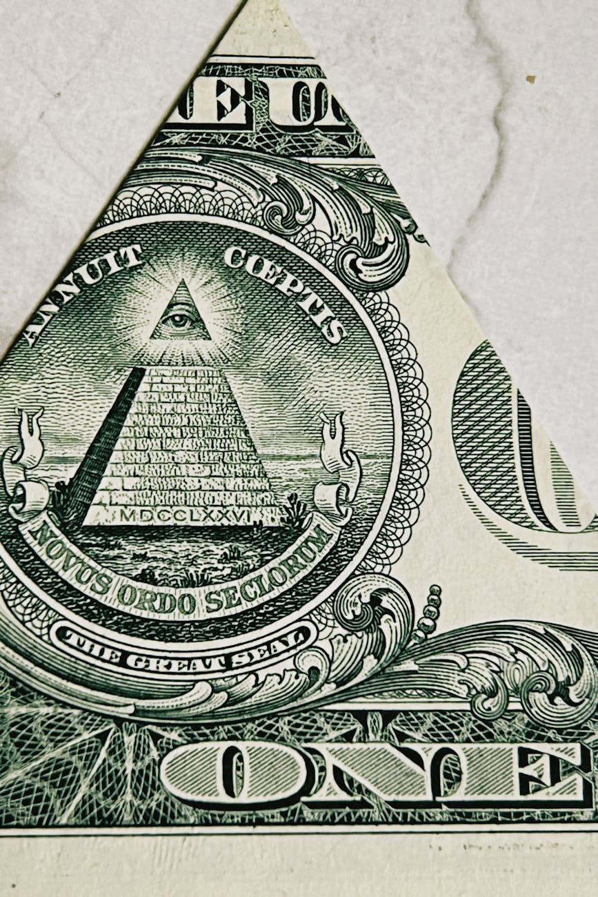 close up of pyramid and eye on us dollar bill