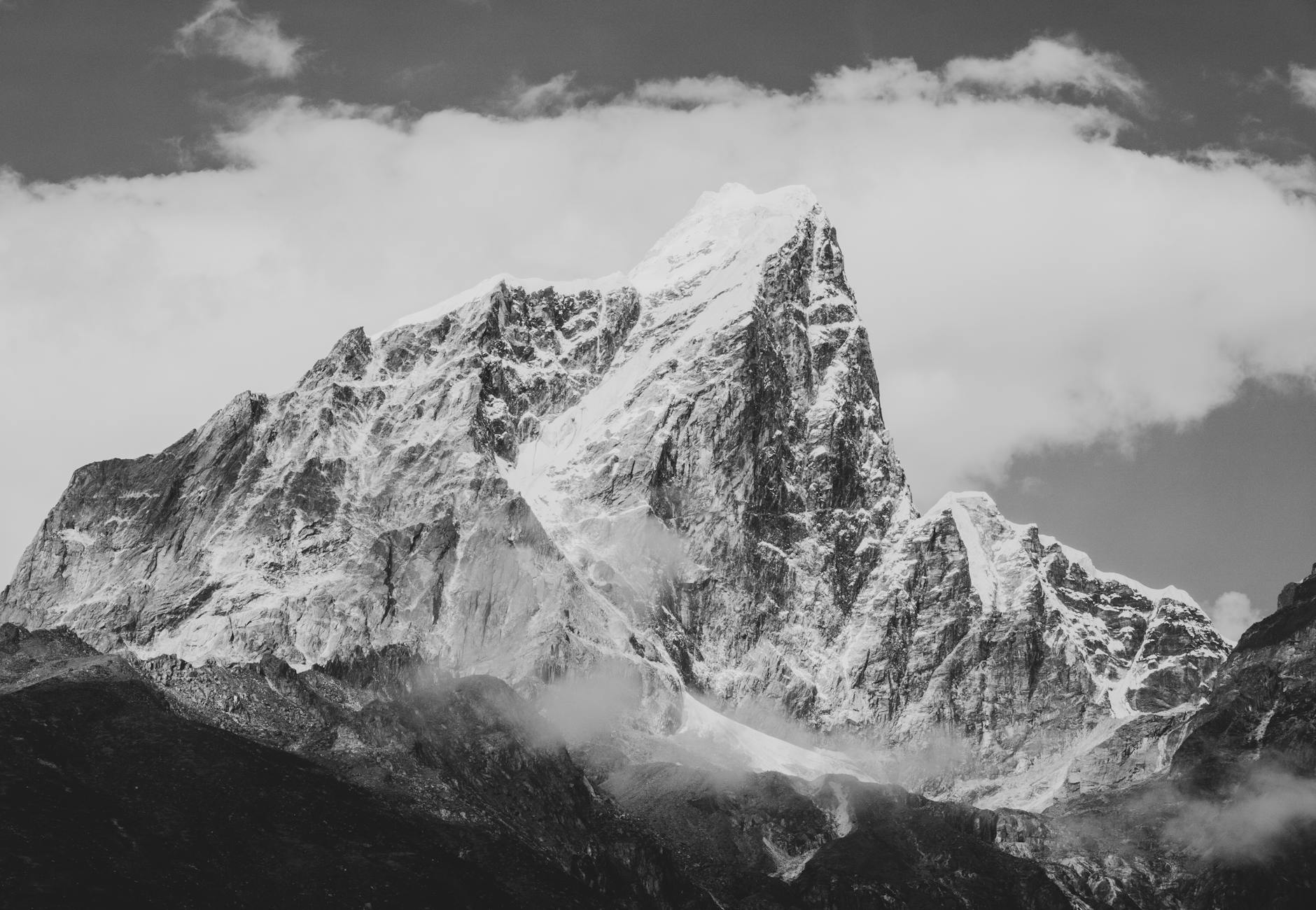 grayscale photo of snow covered mountain